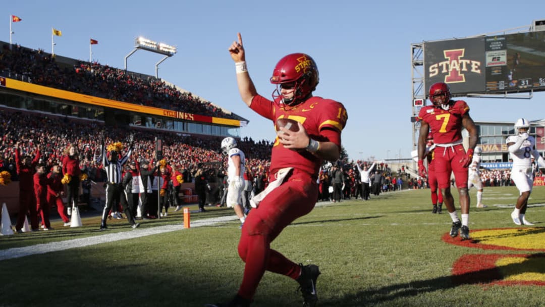 AMES, IA - NOVEMBER 23: Quarterback Brock Purdy #15 of the Iowa State Cyclones celebrates after scoring a touchdown as teammate wide receiver La'Michael Pettway #7 of the Iowa State Cyclones watches on in the second half of play at Jack Trice Stadium on November 23, 2019 in Ames, Iowa. The Iowa State Cyclones won 41-31 over the Kansas Jayhawks. (Photo by David Purdy/Getty Images)