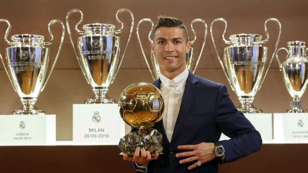 MADRID, SPAIN - DECEMBER 12: Cristiano Ronaldo of Real Madrid poses with the Ballon D'Or 2016 trophy at Estadio Santiago Bernabeu on December 12, 2016 in Madrid, Spain. (Photo by Angel Martinez/Real Madrid via Getty Images)