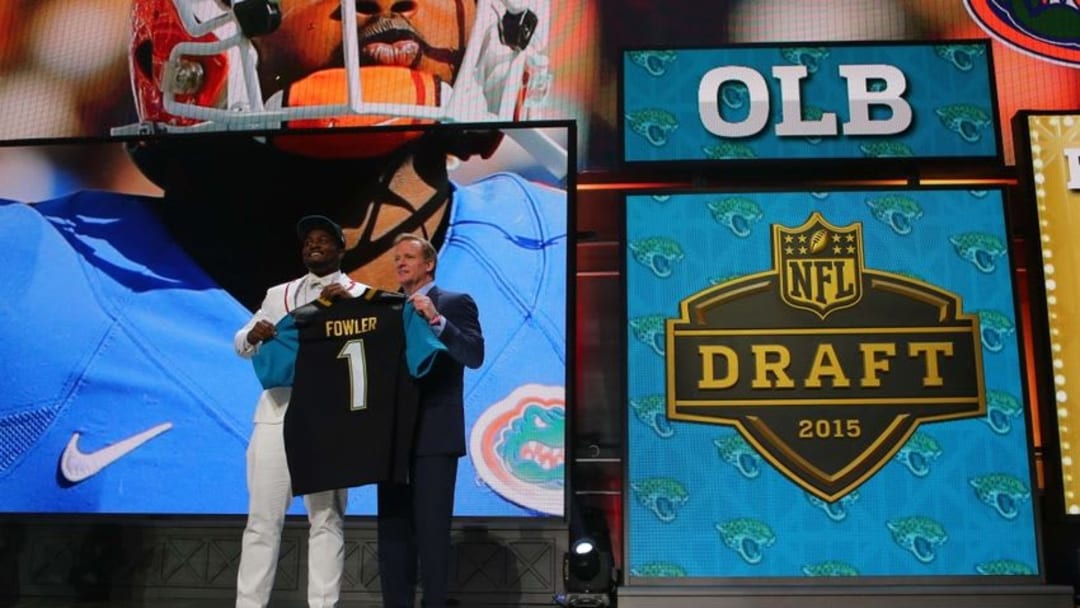 Apr 30, 2015; Chicago, IL, USA; Dante Fowler Jr. (Florida) poses for a photo with NFL commissioner Roger Goodell after being selected as the number third overall pick to the Jacksonville Jaguars in the first round of the 2015 NFL Draft at the Auditorium Theatre of Roosevelt University. Mandatory Credit: Dennis Wierzbicki-USA TODAY Sports