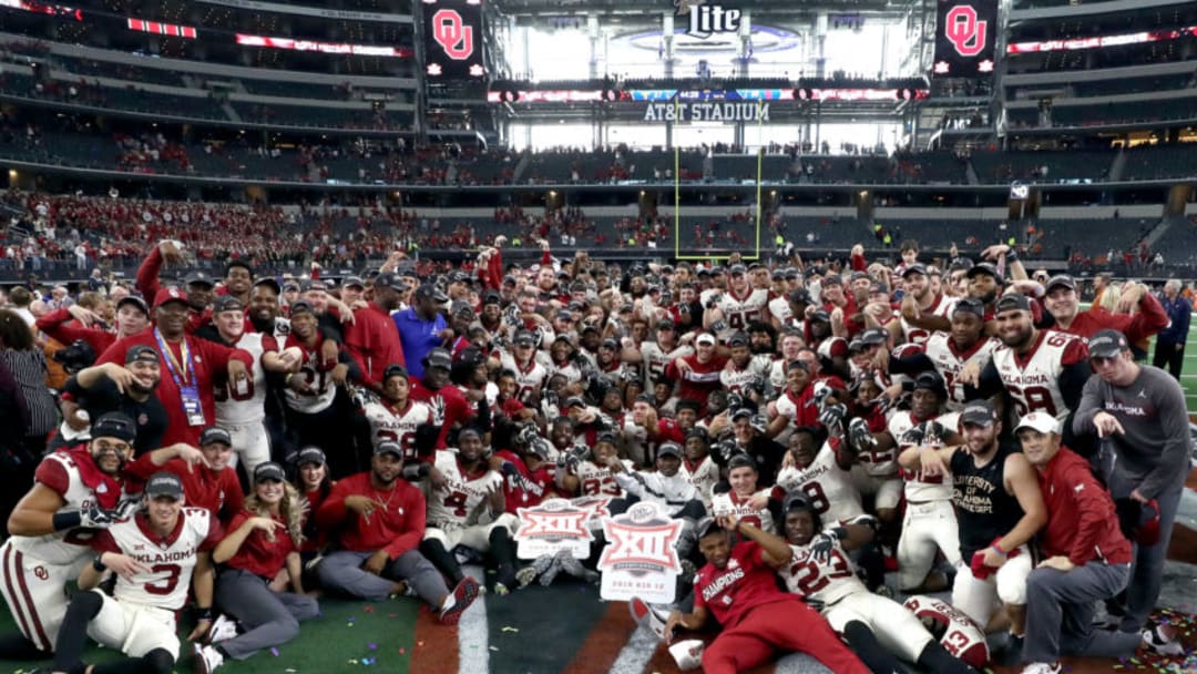 ARLINGTON, TEXAS - DECEMBER 01: The Oklahoma Sooners celebrate a 39-27 Big 12 Championship win against the Texas Longhorns at AT&T Stadium on December 01, 2018 in Arlington, Texas. (Photo by Ronald Martinez/Getty Images)