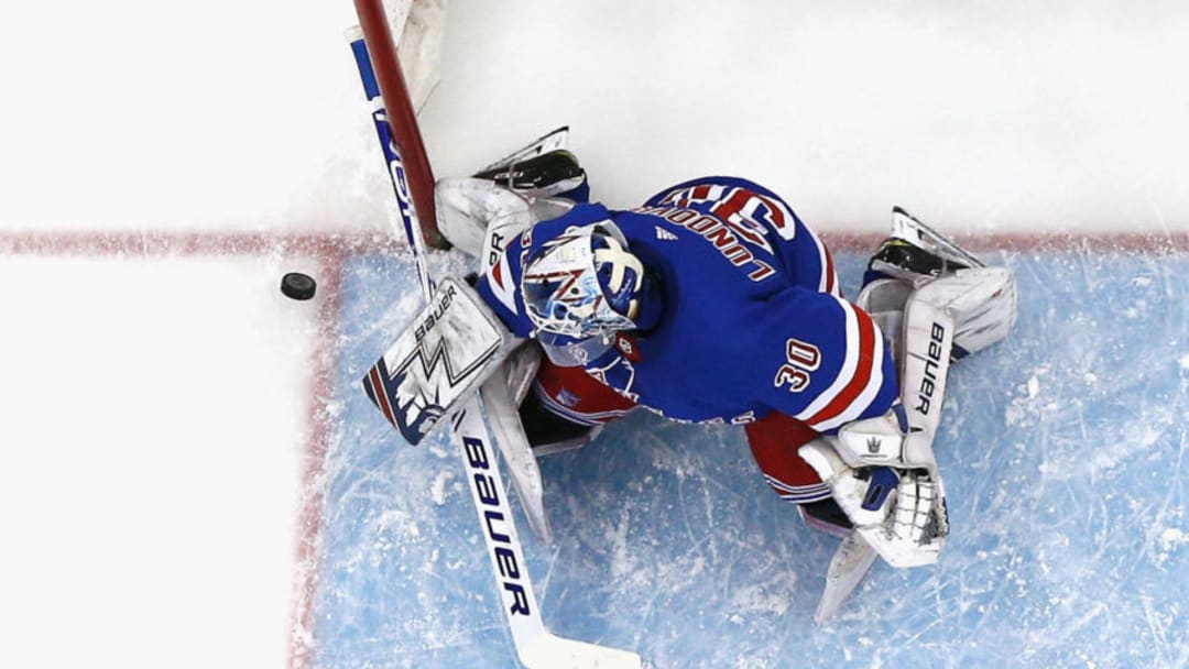 NEWARK, NJ - JANUARY 31: Henrik Lundqvist #30 of the New York Rangers makes a save during the game against the New Jersey Devils at Prudential Center on January 31, 2019 in Newark, New Jersey. (Photo by Andy Marlin/NHLI via Getty Images)