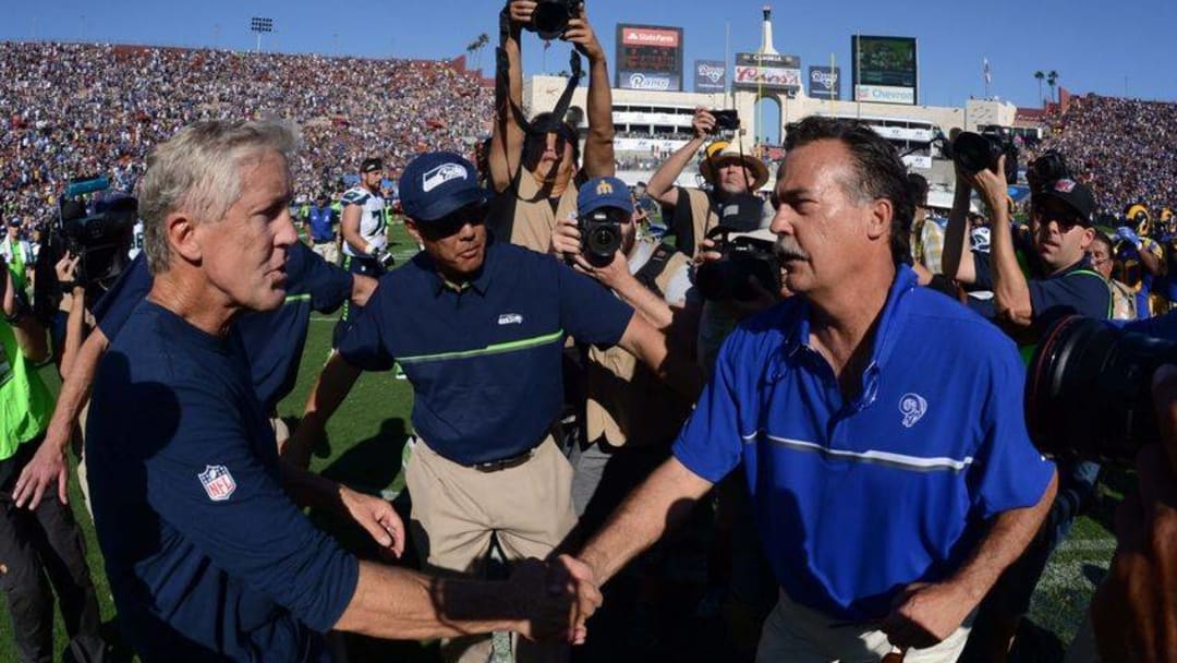 Sep 18, 2016; Los Angeles, CA, USA; Seattle Seahawks coach Pete Carroll (left) and Los Angeles Rams coach Jeff Fisher shake hands after a NFL game at Los Angeles Memorial Coliseum. The Rams defeated the Seahawks 9-3. Mandatory Credit: Kirby Lee-USA TODAY Sports
