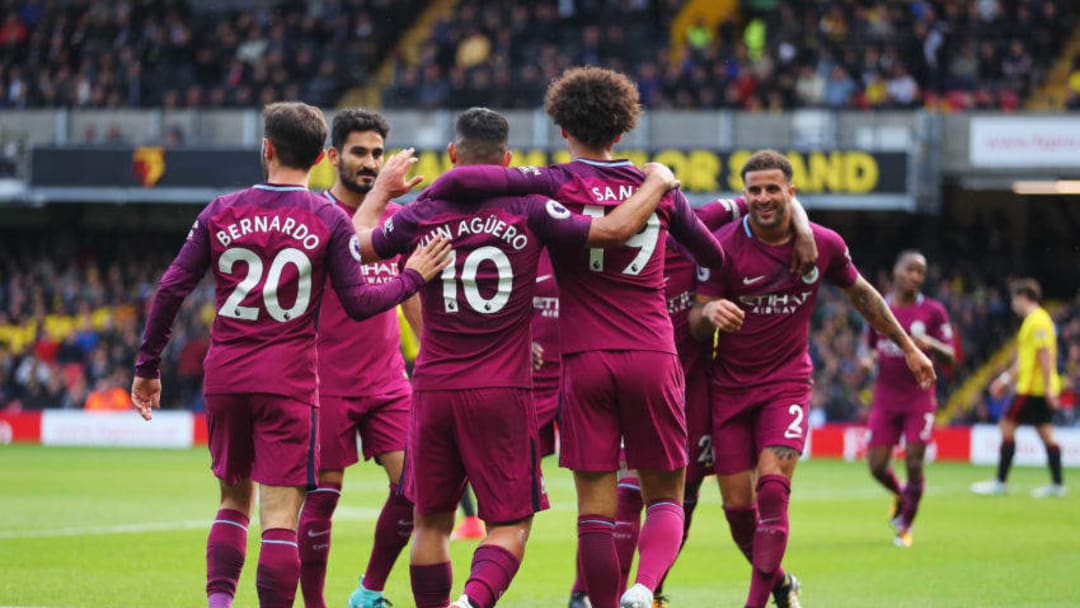 WATFORD, ENGLAND - SEPTEMBER 16: Sergio Aguero of Manchester City celebrates scoring his sides fifth goal with his Manchester City team mates during the Premier League match between Watford and Manchester City at Vicarage Road on September 16, 2017 in Watford, England. (Photo by Richard Heathcote/Getty Images)
