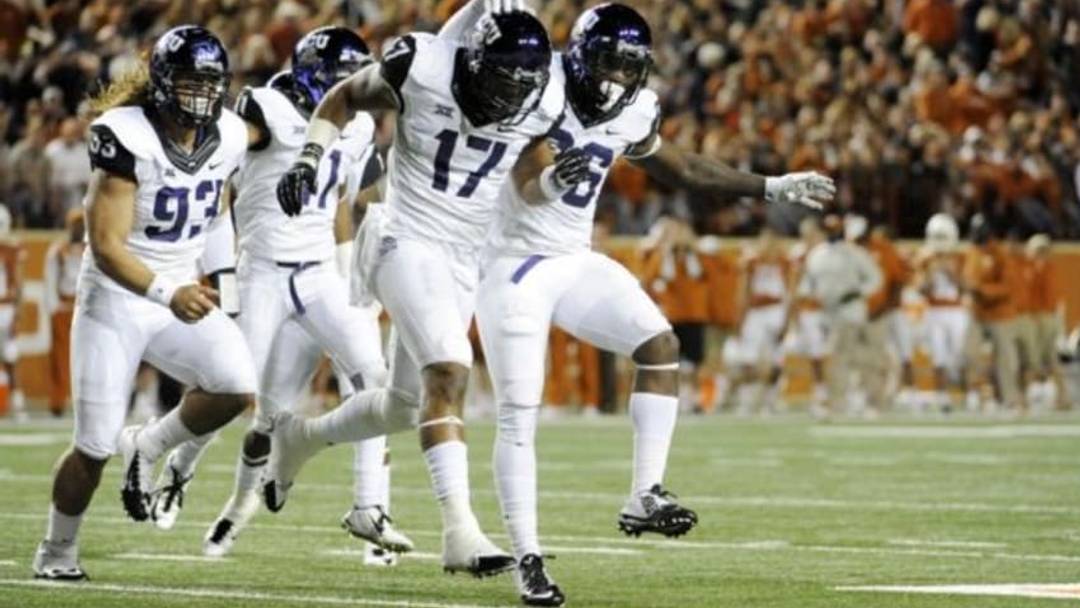 Nov 27, 2014; Austin, TX, USA; TCU Horned Frogs safety Sam Carter (17) celebrates with teammates after intercepting a pass against the Texas Longhorns during the game at Darrell K Royal-Texas Memorial Stadium. Mandatory Credit: Brendan Maloney-USA TODAY Sports Nov 27, 2014; Austin, TX, USA; TCU Horned Frogs safety Sam Carter (17) celebrates with teammates after intercepting a pass against the Texas Longhorns during the game at Darrell K Royal-Texas Memorial Stadium. Mandatory Credit: Brendan Maloney-USA TODAY Sports