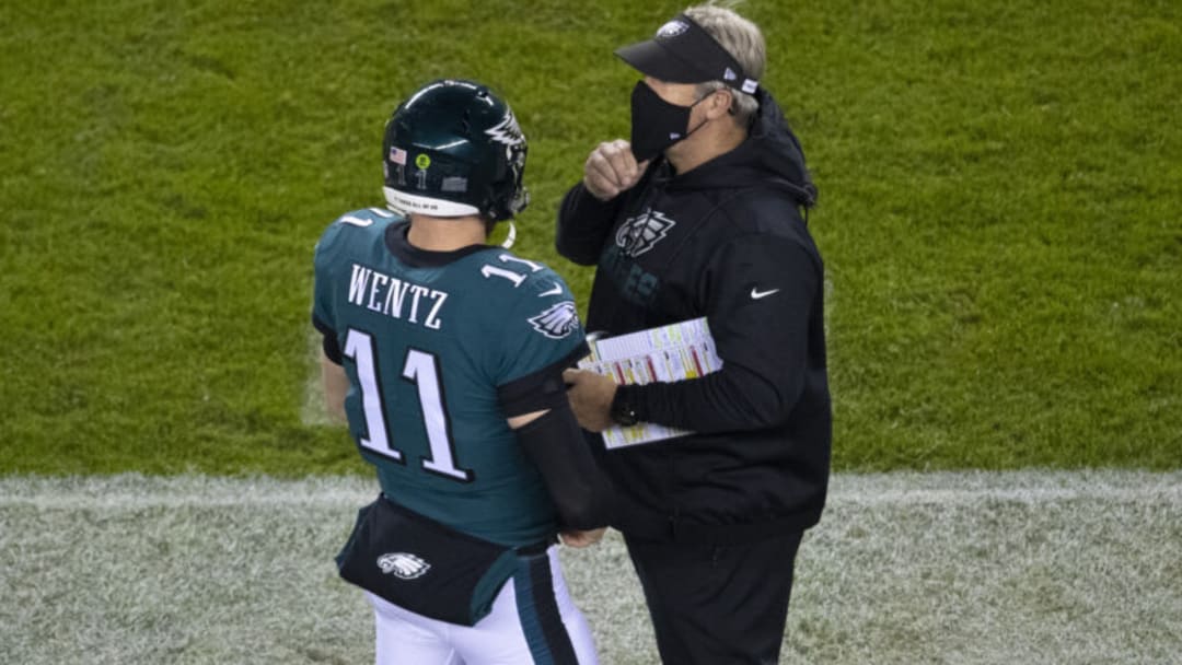 PHILADELPHIA, PA - NOVEMBER 30: Carson Wentz #11 of the Philadelphia Eagles talks to head coach Doug Pederson against the Seattle Seahawks at Lincoln Financial Field on November 30, 2020 in Philadelphia, Pennsylvania. (Photo by Mitchell Leff/Getty Images)