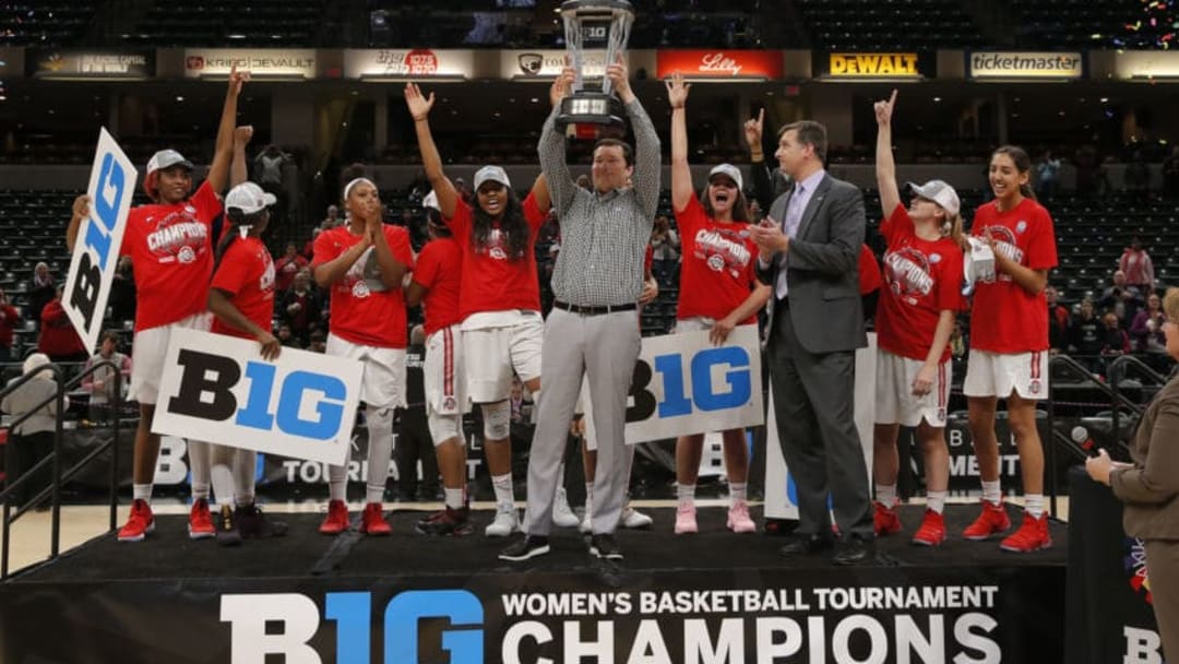 INDIANAPOLIS, IN - MARCH 04: Ohio State Buckeyes Head Coach Kenin McGuff holds up the Big Ten Championship trophy after defeating the Maryland Terrapins during the Big Ten Women's Championship game between the Ohio State Buckeyes and Maryland Terrapins on March 4, 2018, at Bankers Life Fieldhouse in Indianapolis, IN. The Ohio State Buckeyes defeated the Maryland Terrapins 79-69. (Photo by Jeffrey Brown/Icon Sportswire via Getty Images)