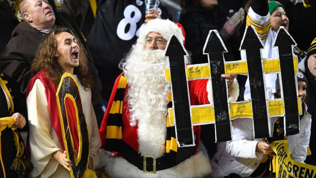 PITTSBURGH, PA - DECEMBER 25: Pittsburgh Steelers fans dressed up as Jesus and Santa Claus hold up a during the game between the Pittsburgh Steelers and the Baltimore Ravens at Heinz Field on December 25, 2016 in Pittsburgh, Pennsylvania. (Photo by Joe Sargent/Getty Images)