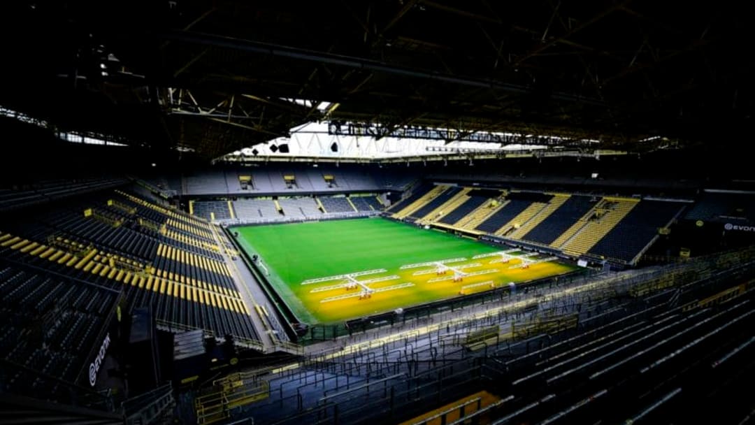 The empty stadium Signal Iduna Park of the Bundesliga club Borussia Dortmund is pictured in Dortmund, western Germany, on May 5, 2020, due to the spread of the novel coronavirus COVID-19. - German football is waiting for the green light as during Chancellor Angela Merkel's crucial meeting with the Presidents of the Lander (regional states) on May 6, 2020 will be decided whether or not to allow the Bundesliga to resume, behind closed doors and on the basis of a draconian health protocol. (Photo by Ina FASSBENDER / AFP) (Photo by INA FASSBENDER/AFP via Getty Images)