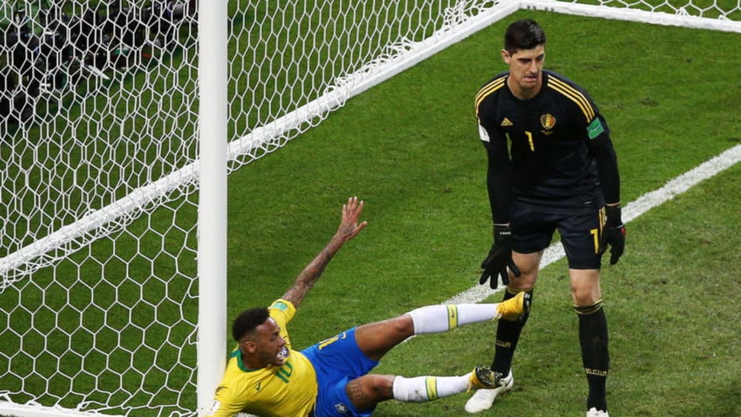 KAZAN, RUSSIA - JULY 6, 2018: Brazil's Neymar da Silva (L) and Belgium's goalkeeper Thibaut Courtois in a Knockout Stage quarterfinal football match between Brazil and Belgium at Kazan Arena at FIFA World Cup Russia 2018; Belgium won 2-1. Yegor Aleyev/TASS (Photo by Yegor AleyevTASS via Getty Images)