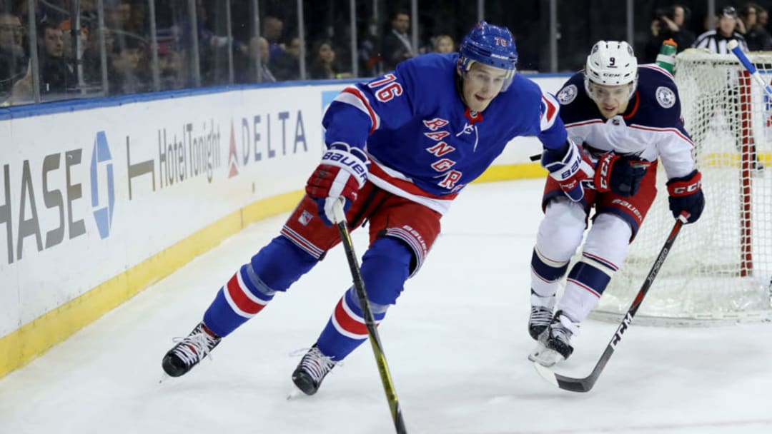 NEW YORK, NY - MARCH 20: Brady Skjei #76 of the New York Rangers skates with the puck against Artemi Panarin #9 of the Columbus Blue Jackets in the first period during their game at Madison Square Garden on March 20, 2018 in New York City. (Photo by Abbie Parr/Getty Images)