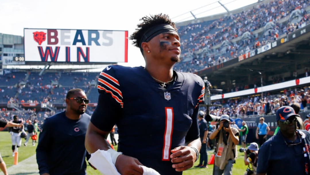 Sep 19, 2021; Chicago, Illinois, USA; Chicago Bears quarterback Justin Fields (1) runs off the field after their 20-17 win over the Cincinnati Bengals at Soldier Field. Mandatory Credit: Jon Durr-USA TODAY Sports