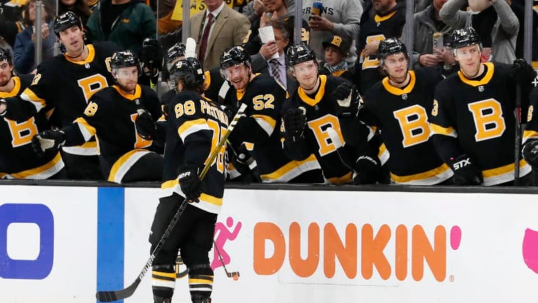 BOSTON, MA - NOVEMBER 29: Boston Bruins right wing David Pastrnak (88) skates by the bench after scoring during a game between the Boston Bruins and the New York Rangers on November 29, 2019, at TD Garden in Boston, Massachusetts. (Photo by Fred Kfoury III/Icon Sportswire via Getty Images)