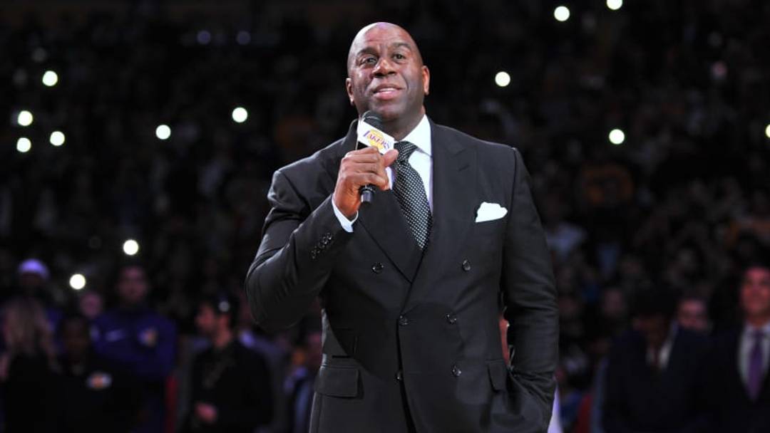LOS ANGELES, CA - DECEMBER 18: Magic Johnson speaks at Kobe Bryant's jersey retirement ceremony during halftime of a basketball game between the Los Angeles Lakers and the Golden State Warriors at Staples Center on December 18, 2017 in Los Angeles, California. (Photo by Allen Berezovsky/Getty Images)