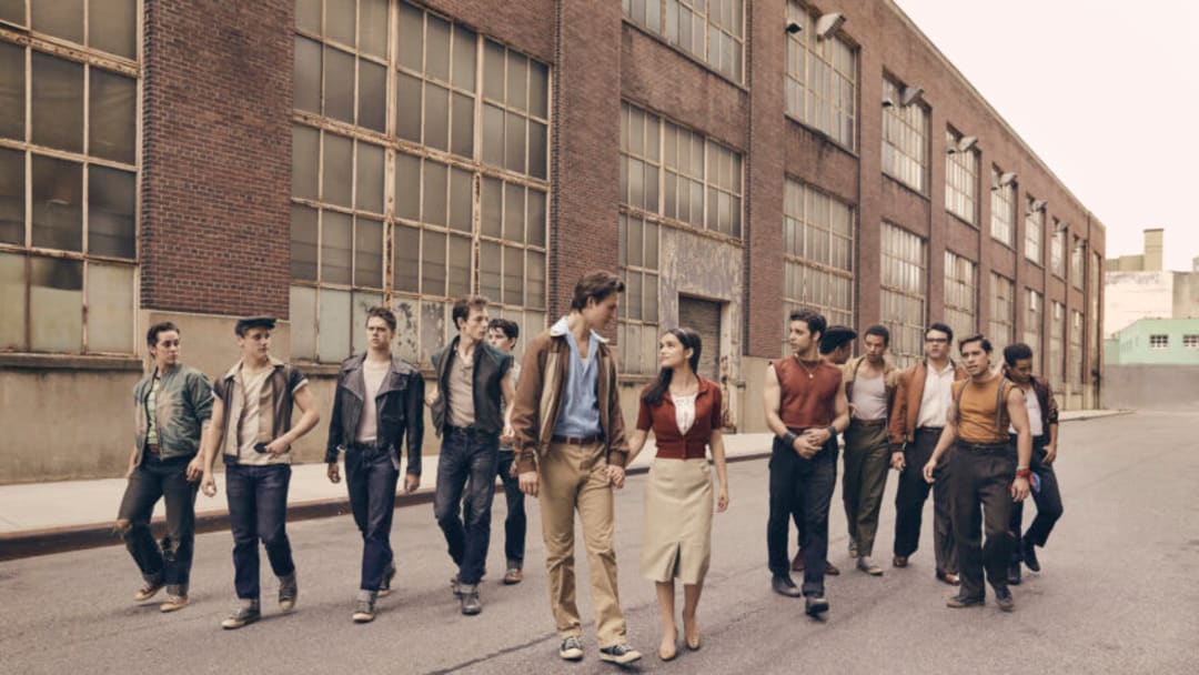 © 2019 Twentieth Century Fox Film Corporation. All Rights Reserved.Photo by Ramona Rosales. Left to Right: Anybodys (Ezra Menas), Mouthpiece (Ben Cook), Action (Sean Harrison Jones); Jets leader Riff (Mike Faist); Baby John (Patrick Higgins); Tony (Ansel Elgort) and Maria (Rachel Zegler); Maria’s brother and Sharks leader Bernardo (David Alvarez); and Sharks members Quique (Julius Anthony Rubio), Chago (Ricardo Zayas), Chino (Josh Andrés Rivera), Braulio (Sebastian Serra) and Pipo (Carlos Sánchez Falú)