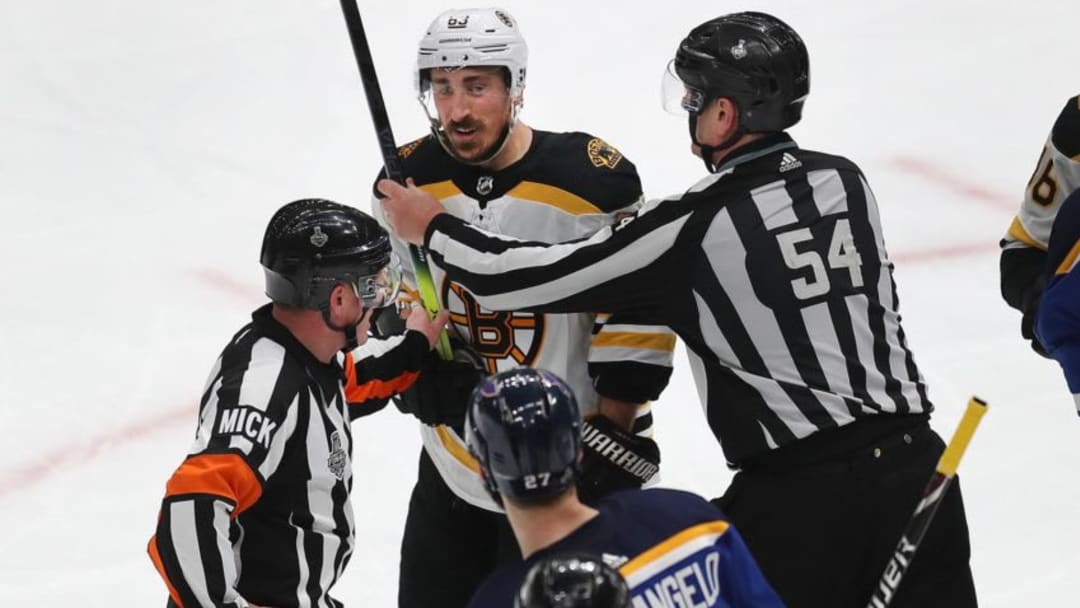 ST. LOUIS, MO - JUNE 1: Referees separate Boston Bruins' Brad Marchand and the Blues' Alex Pietrangelo in the third period. The St. Louis Blues host the Boston Bruins in Game 3 of the 2019 Stanley Cup Finals at the Enterprise Center in St. Louis, MO on June 1, 2019. (Photo by John Tlumacki/The Boston Globe via Getty Images)