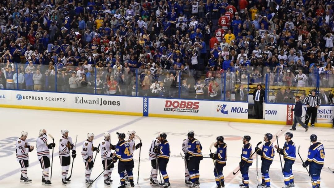 Apr 25, 2016; St. Louis, MO, USA; St. Louis Blues and Chicago Blackhawks teammates line up to shake hands after St. Louis Blues defeat the Chicago Blackhawks 3-2 in game seven of the first round of the 2016 Stanley Cup Playoffs at Scottrade Center. Mandatory Credit: Jasen Vinlove-USA TODAY Sports