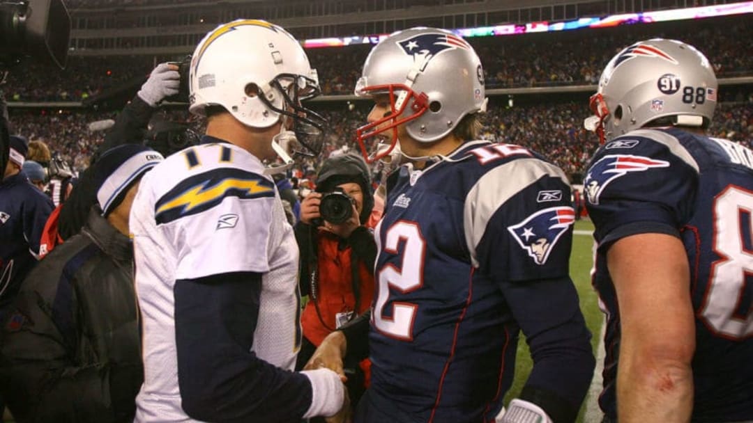 FOXBORO, MA - JANUARY 20: Tom Brady #12 of the New England Patriots is congratulated by Philip Rivers #17 of the San Diego Chargers after the Patriots 21-12 win in the AFC Championship Game on January 20, 2008 at Gillette Stadium in Foxboro, Massachusetts. (Photo by Al Bello/Getty Images)