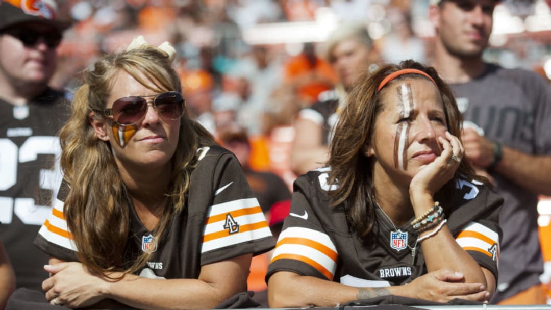 CLEVELAND, OH - SEPTEMBER 8: Cleveland Browns fans watch the final minutes of the game against the Miami Dolphins during the second half at First Energy Stadium on September 8, 2013 in Cleveland, Ohio. The Dolphins defeated the Browns 23-10. (Photo by Jason Miller/Getty Images)