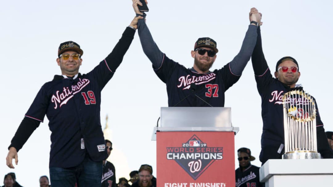 WASHINGTON, DC - NOVEMBER 02: Anibal Sanchez #19, Stephen Strasburg #37 and Gerardo Parra #88 of the Washington Nationals celebrate during a parade to celebrate the Washington Nationals World Series victory over the Houston Astros on November 2, 2019 in Washington, DC. This is the first World Series win for the Nationals in 95 years. (Photo by Patrick McDermott/Getty Images)
