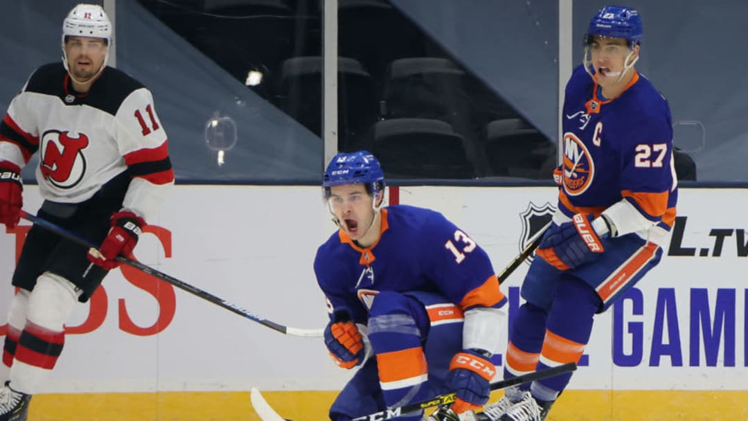 UNIONDALE, NEW YORK - JANUARY 21: Mathew Barzal #13 of the New York Islanders celebrates his goal at 4:43 of the first period against the New Jersey Devils at Nassau Coliseum on January 21, 2021 in Uniondale, New York. (Photo by Bruce Bennett/Getty Images) UNIONDALE, NEW YORK - JANUARY 21: Mathew Barzal #13 of the New York Islanders celebrates his goal at 4:43 of the first period against the New Jersey Devils at Nassau Coliseum on January 21, 2021 in Uniondale, New York. (Photo by Bruce Bennett/Getty Images)