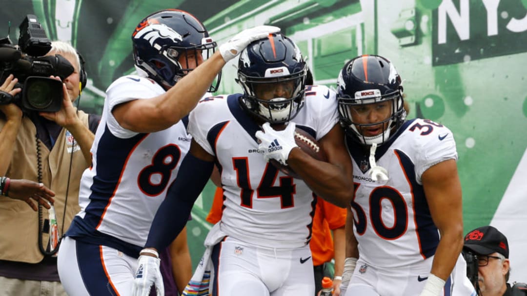EAST RUTHERFORD, NEW JERSEY - OCTOBER 07: Courtland Sutton #14 of the Denver Broncos celebrates with his teammates after scoring an 8 yard touchdown against the New York Jets during the first quarter in the game at MetLife Stadium on October 07, 2018 in East Rutherford, New Jersey. (Photo by Mike Stobe/Getty Images)