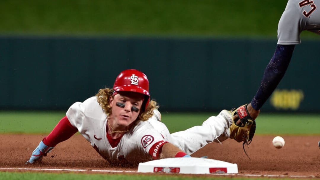 Harrison Bader #48 of the St. Louis Cardinals slides into third for a triple during the eighth inning against the Detroit Tigers at Busch Stadium on August 24, 2021 in St Louis, Missouri. (Photo by Jeff Curry/Getty Images)