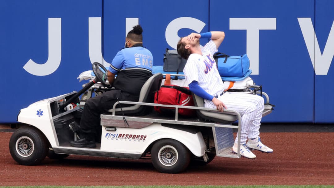 NEW YORK, NEW YORK - AUGUST 13: Jeff McNeil #6 of the New York Mets is carted off the field after injuring his knee crashing into the wall making a diving catch hit by Asdrubal Cabrera #13 of the Washington Nationals in the first inning during their game at Citi Field on August 13, 2020 in New York City. (Photo by Al Bello/Getty Images) NEW YORK, NEW YORK - AUGUST 13: Jeff McNeil #6 of the New York Mets is carted off the field after injuring his knee crashing into the wall making a diving catch hit by Asdrubal Cabrera #13 of the Washington Nationals in the first inning during their game at Citi Field on August 13, 2020 in New York City. (Photo by Al Bello/Getty Images)