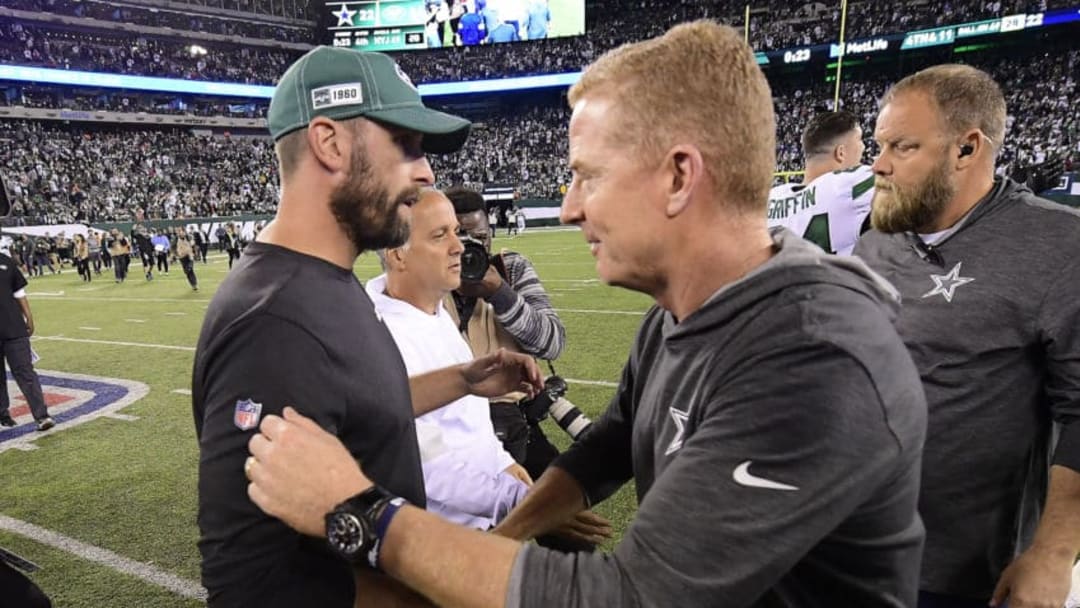 EAST RUTHERFORD, NEW JERSEY - OCTOBER 13: Head coach Adam Gase of the New York Jets and head coach Jason Garrett of the Dallas Cowboys shakes hands following the Jets 24-22 win at MetLife Stadium on October 13, 2019 in East Rutherford, New Jersey. (Photo by Steven Ryan/Getty Images)