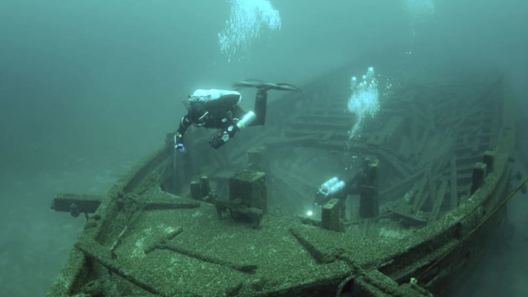 Maritime archaeologists survey the Rouse Simmons shipwreck on the bottom of Lake Michigan.