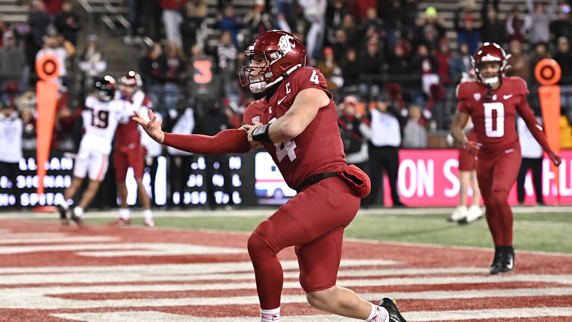 Washington State Cougars QB Zevi Eckhaus celebrates a touchdown against Oregon State