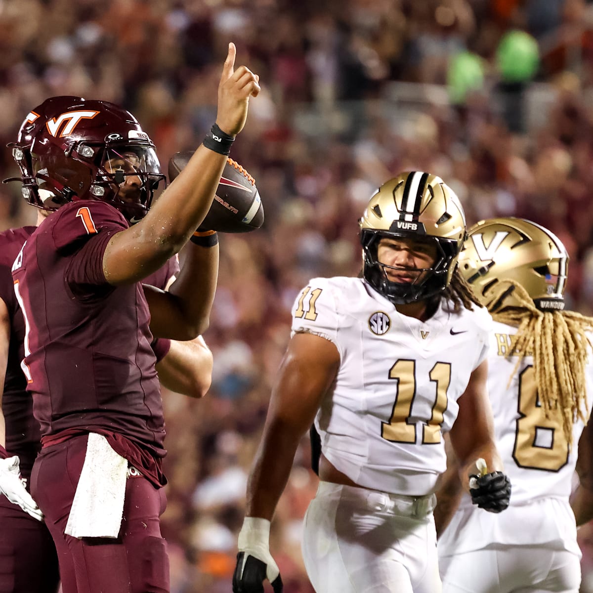 Virginia Tech football team celebrating a win