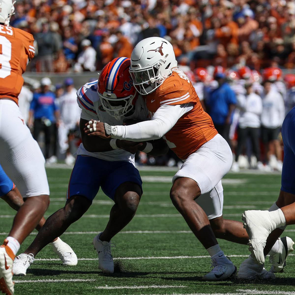 Colin Simmons swarmed by medical staff after going down with injury vs. Florida