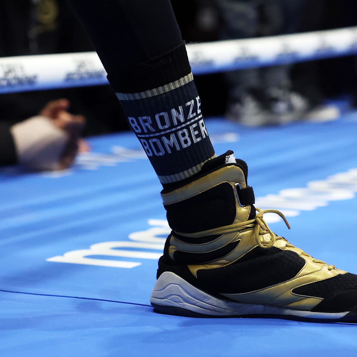 Why do boxers wear shoes \u0026 MMA fighters don't?