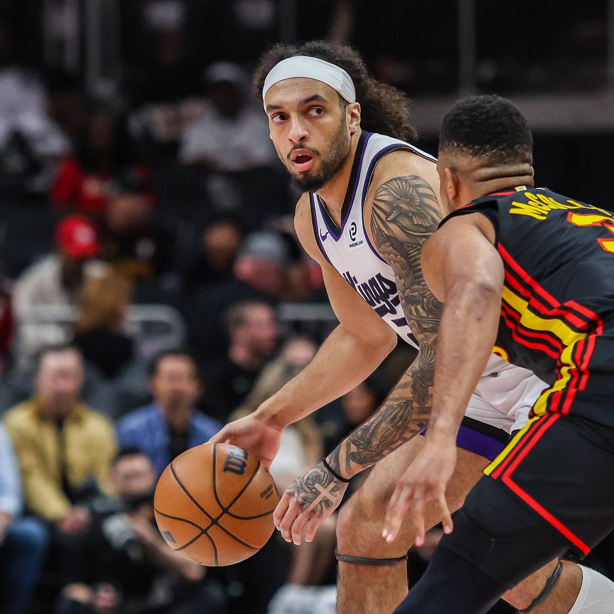 Devin Carter defending during a Kings game