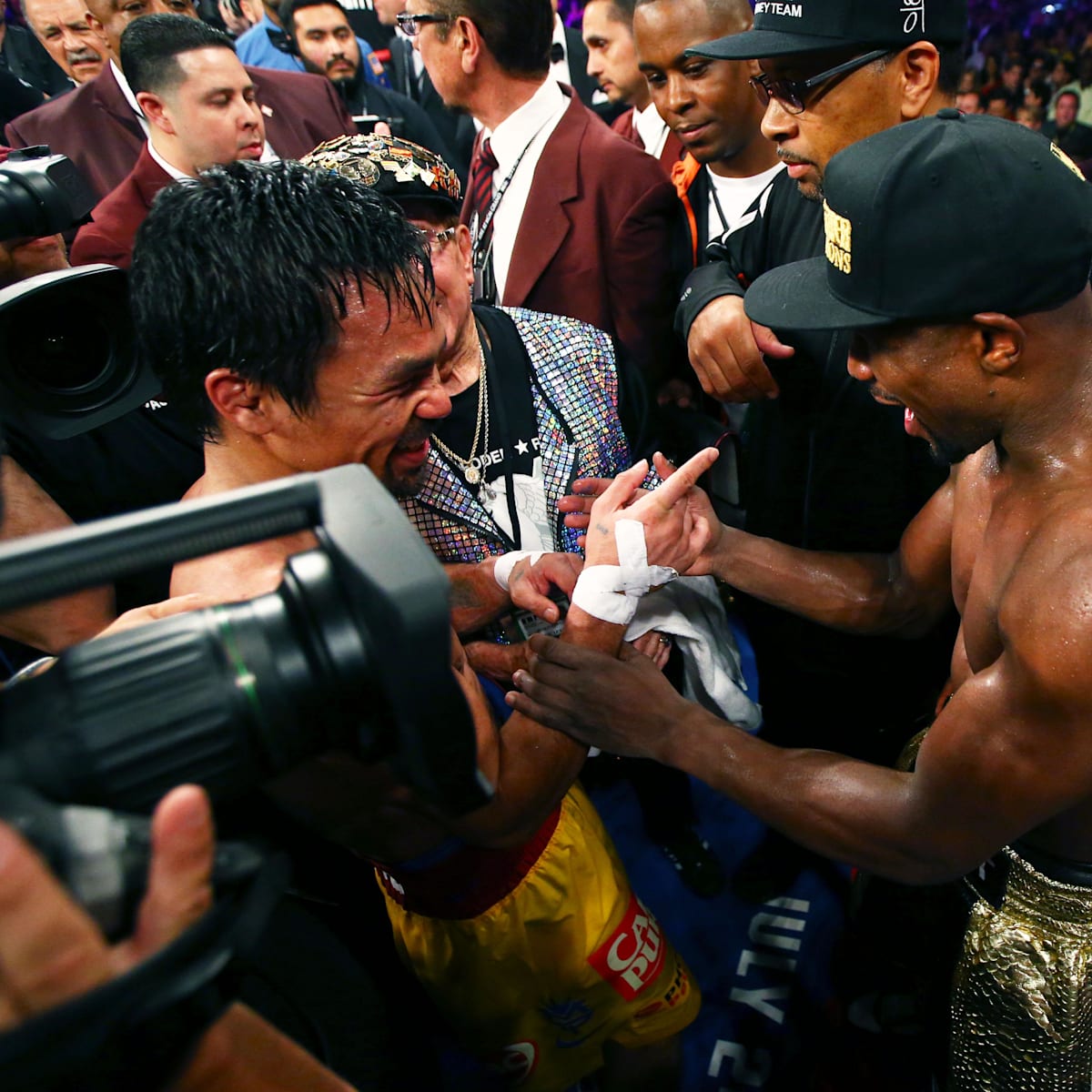 si.com - Brigid Kennedy - Floyd Mayweather, Manny Pacquiao to Meet in Upcoming Boxing Rematch on Netflix