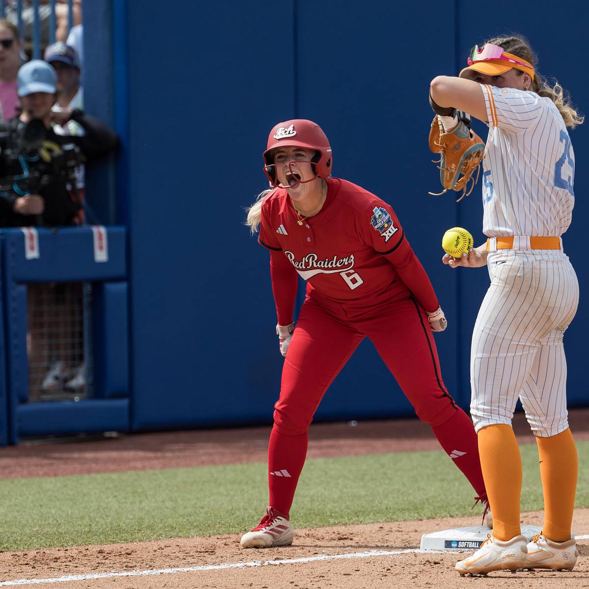 si.com - Brigid Kennedy - Trouble at the WCWS: Explaining the Handshake Drama Between Taylor Pannell and Karen Weekly