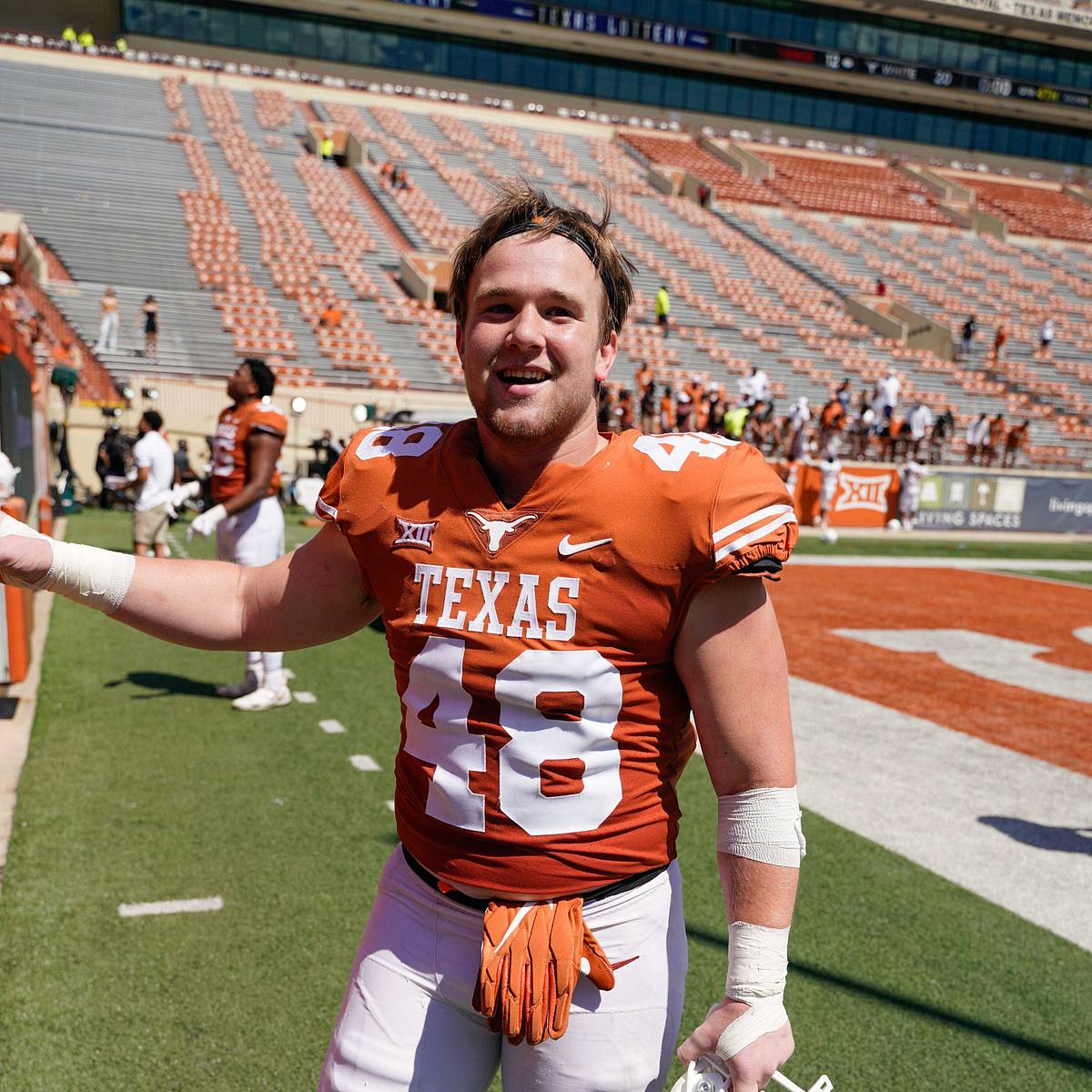 DeMarvion Overshown Honors Jake Ehlinger With Custom Texas Jersey Before Cowboys Game