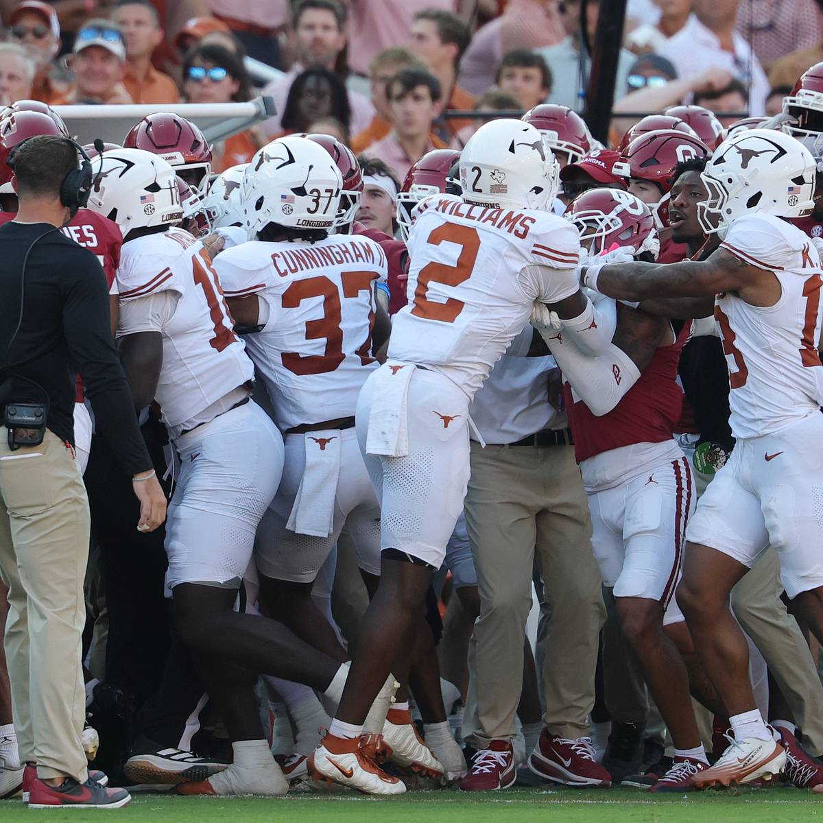 Coaches Restrain Texas and Oklahoma Players During Heated Postgame Exchange
