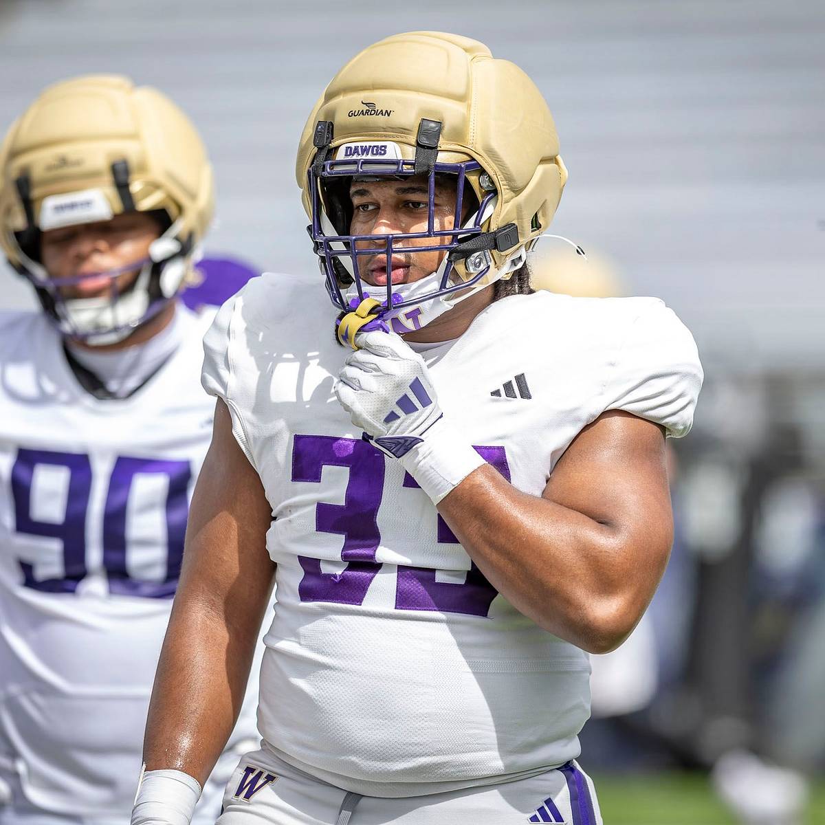 si.com - Dan Raley - Conley Fits In With UW D-Line Cast of Characters