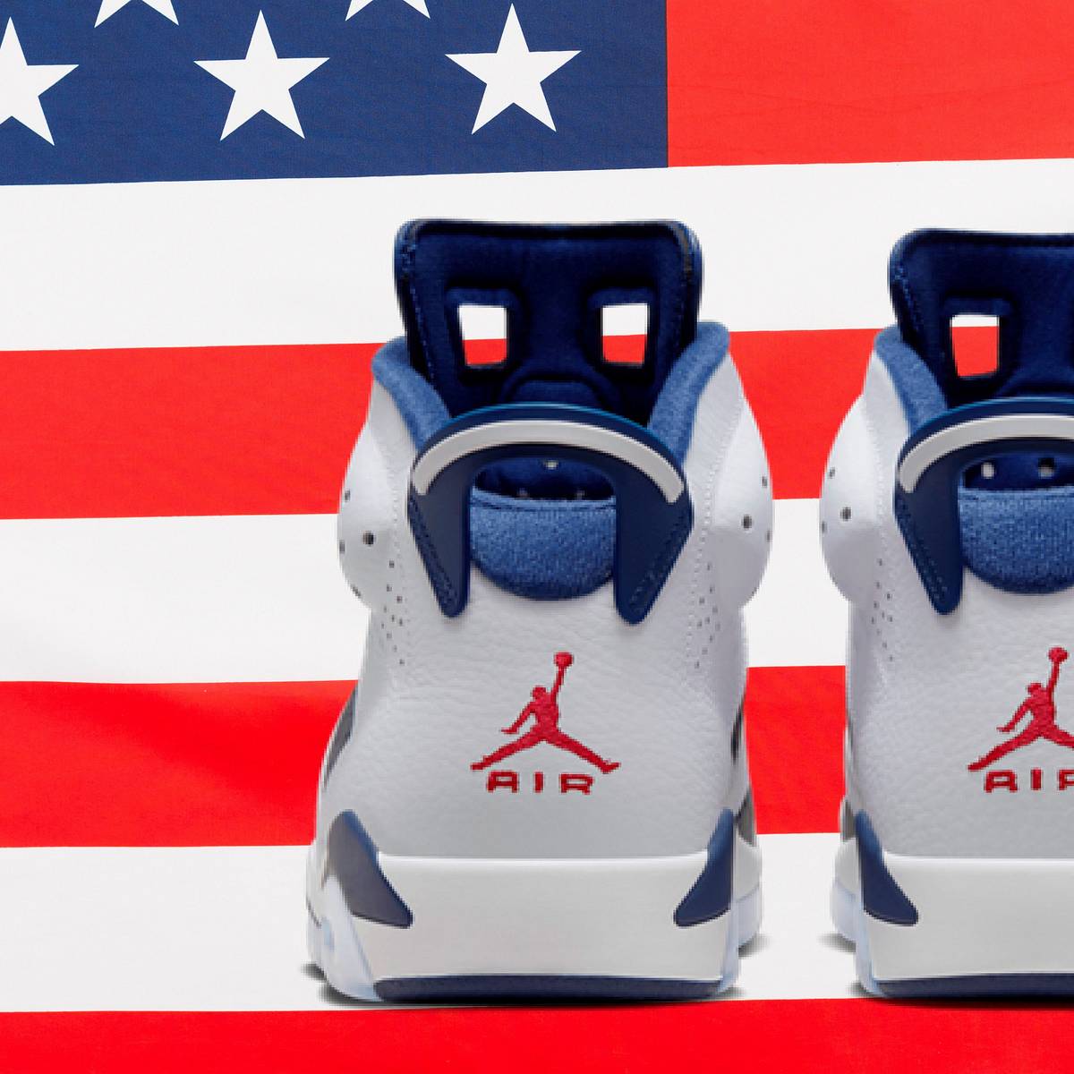 Jordan Navy Blue and Red Sneaker Interior with Jumpman Label Awake NY just teased an upcoming “Midnight Navy” Air Jordan  main image 3