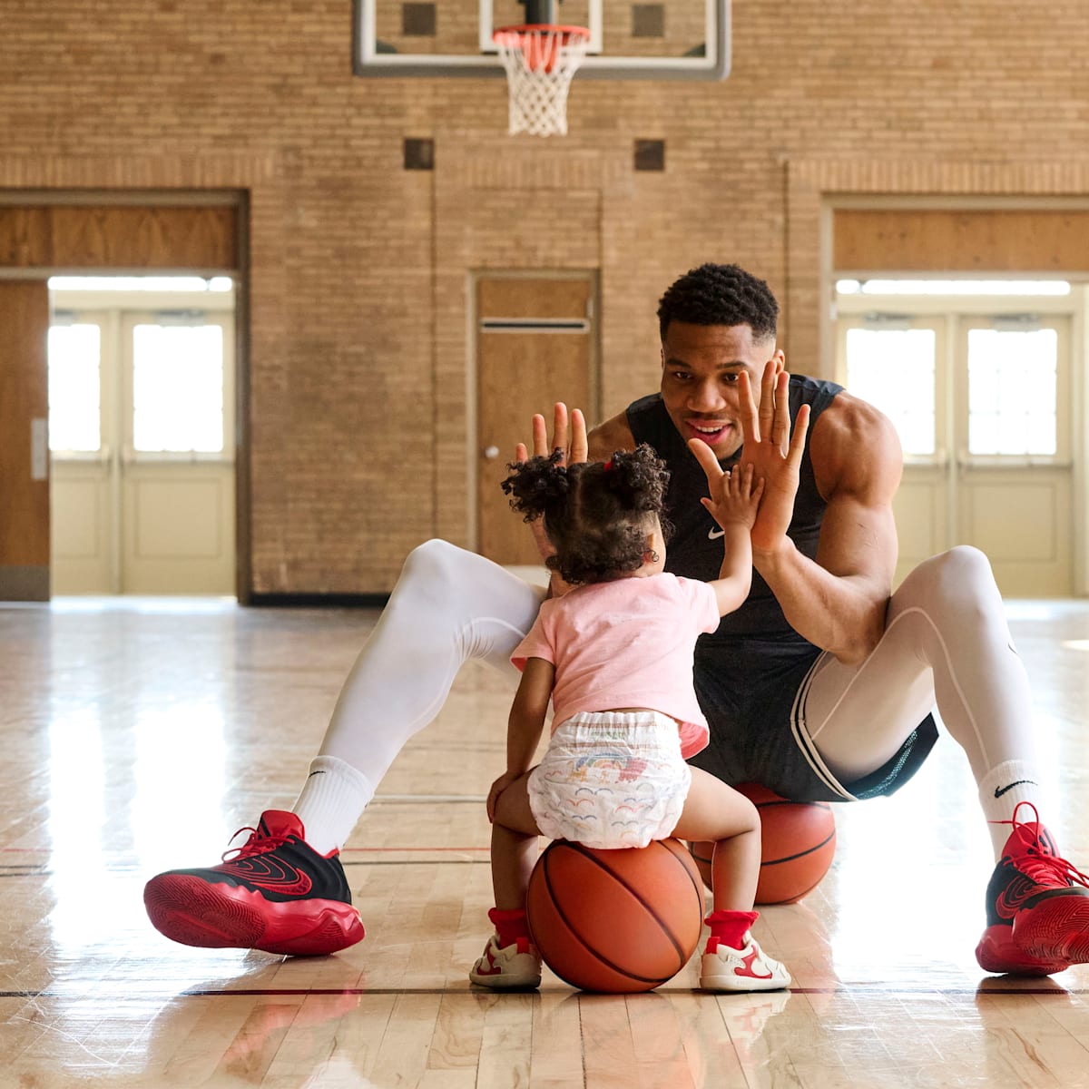 giannis antetokounmpo giving shoes