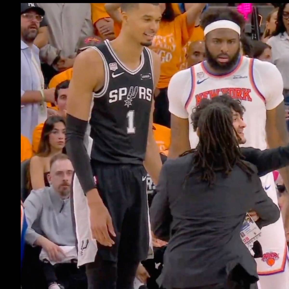 si.com - Brigid Kennedy - Fan Who Stormed Court for Wemby Selfie Rightfully Gets the Stiffest of Punishments From NBA