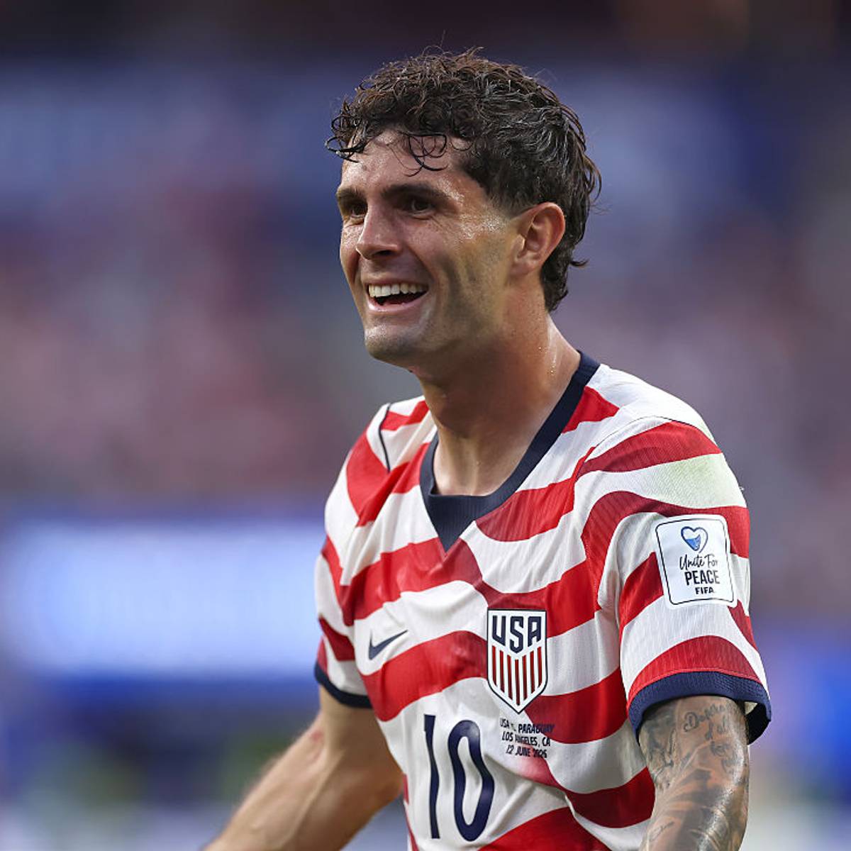 Christian Pulisic celebrating during World Cup coverage
