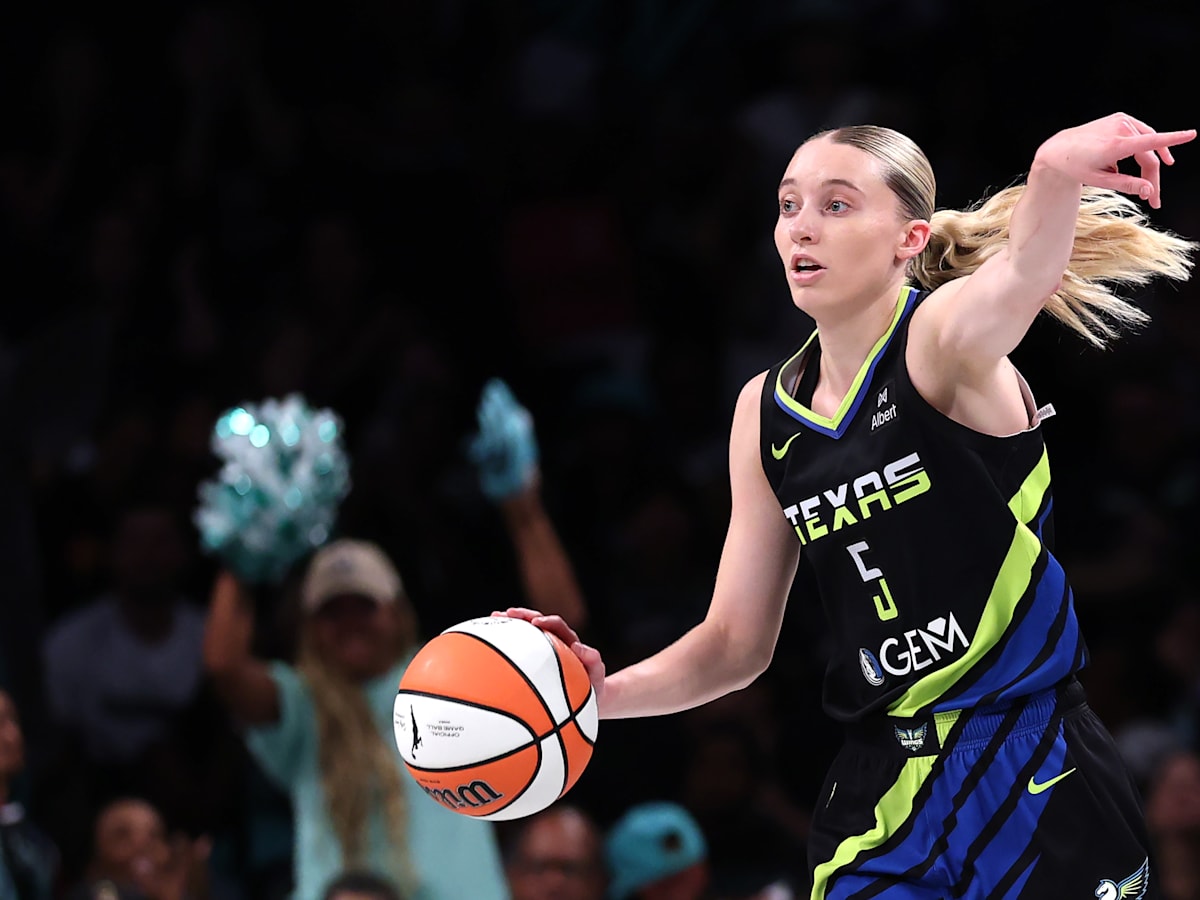 Paige Bueckers is playing Connect Four on the basketball court