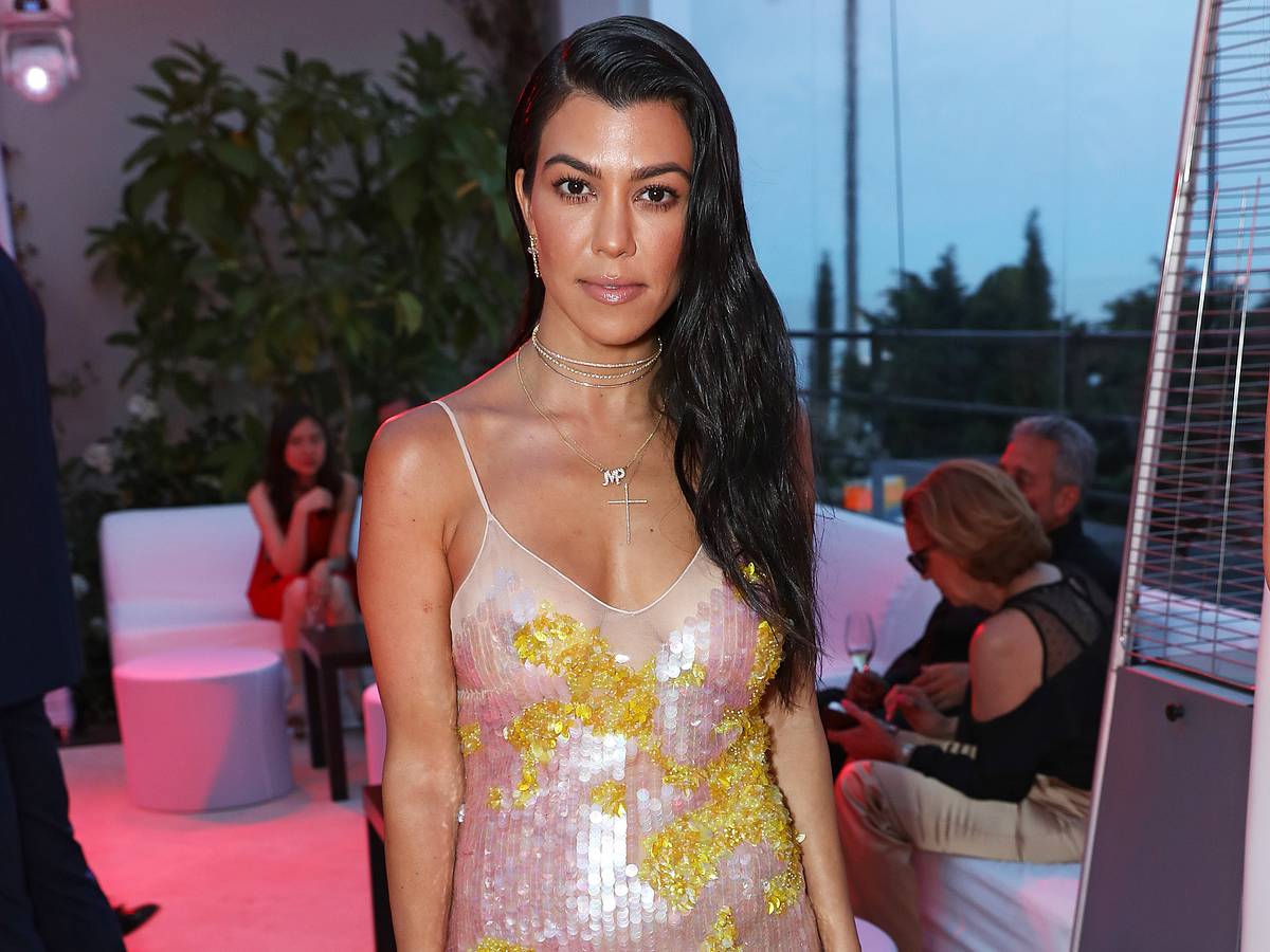 sachin and babi light blue dress Kourtney Kardashian's black strapless vinyl dress