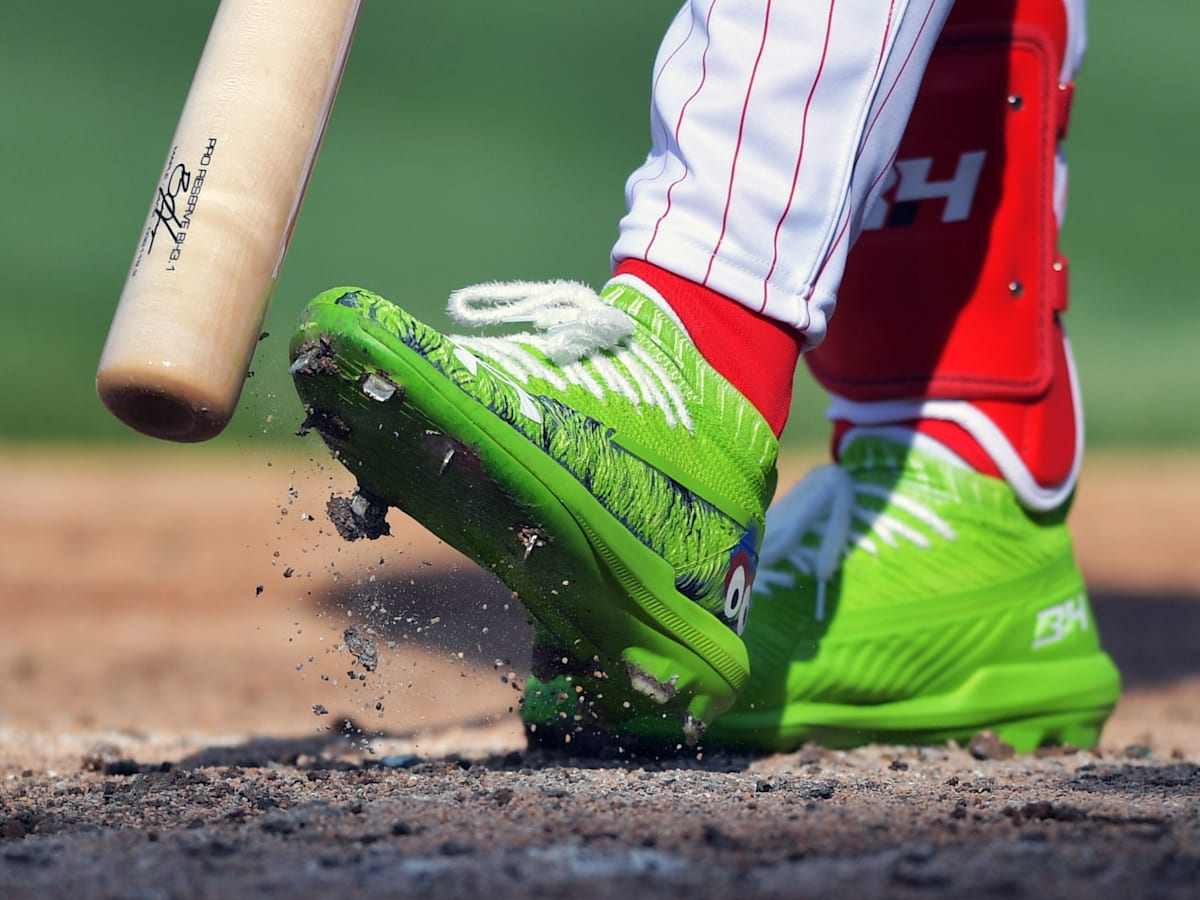 Why does Bryce Harper wear green cleats