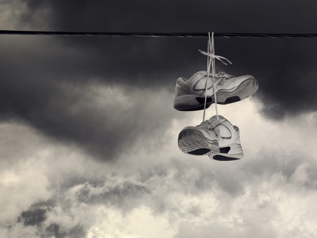 Dunkin donuts shoes hanging from power lines discount