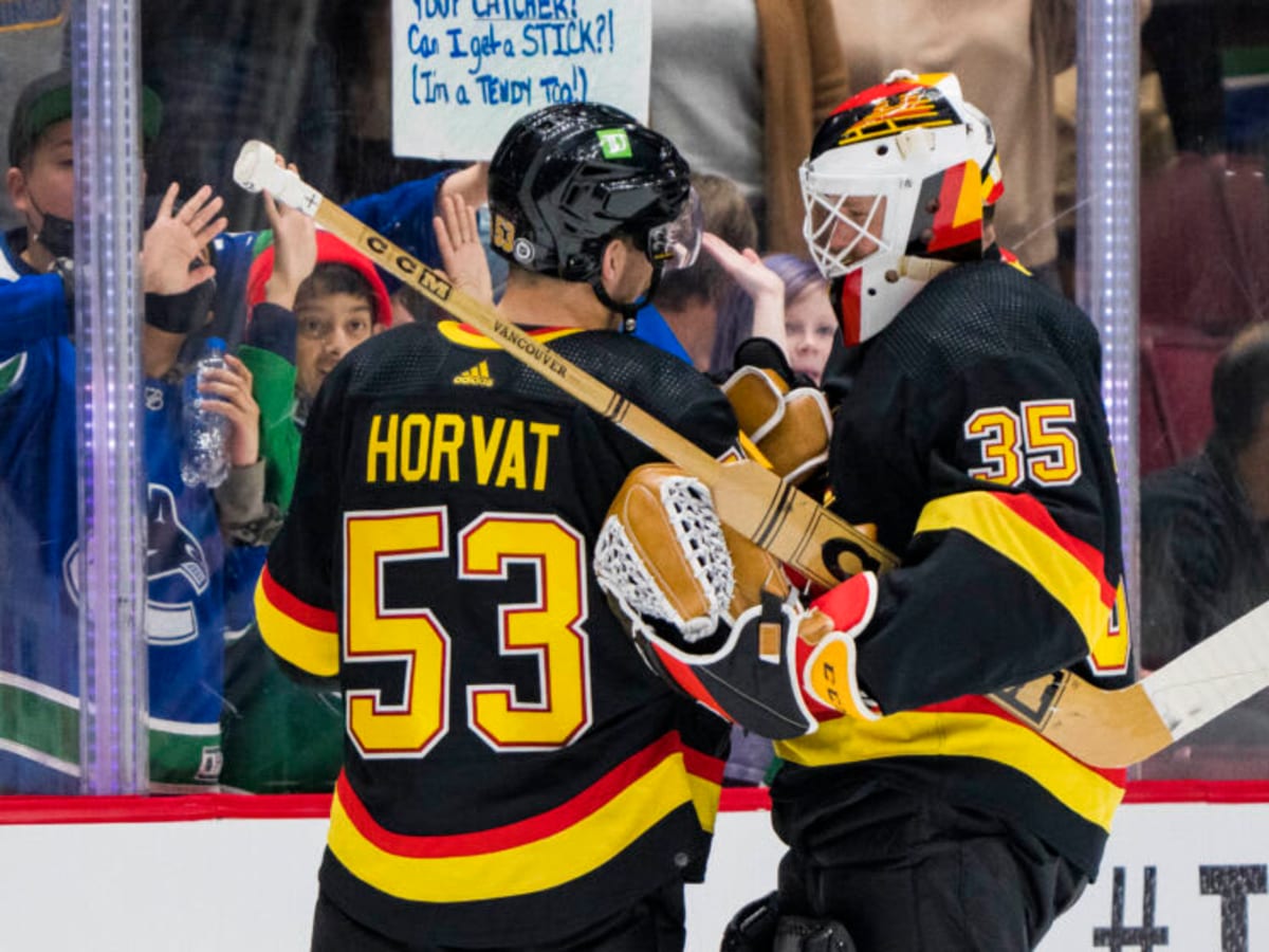 Canucks jersey skate sales