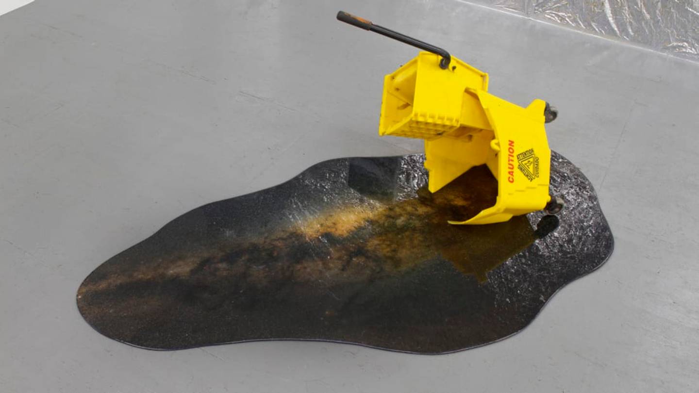 Artist Fuses Surreal Scenes Into Fake Puddles