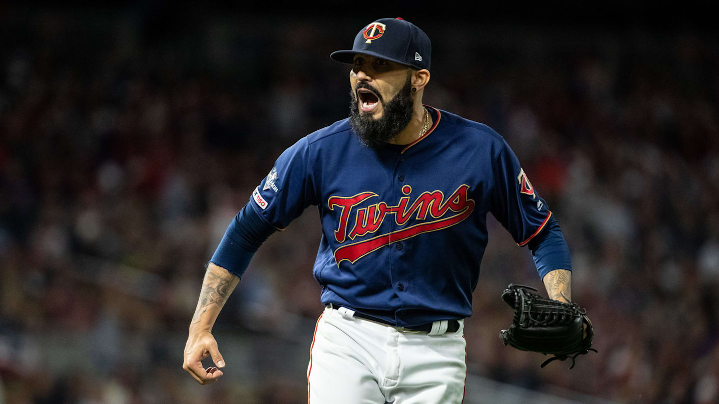 San Francisco Giants' Sergio Romo admires his 2012 World Series